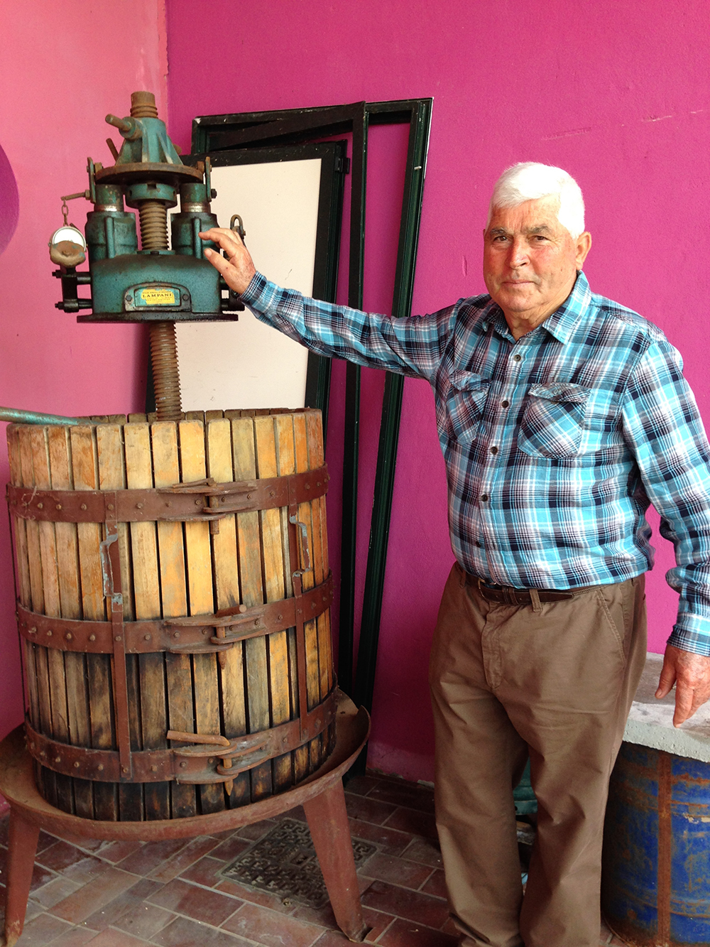 Anibale and his wine press in Casa di Baal, Anibale is a white haired wine producer