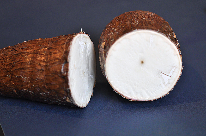 yuca root sliced in a half